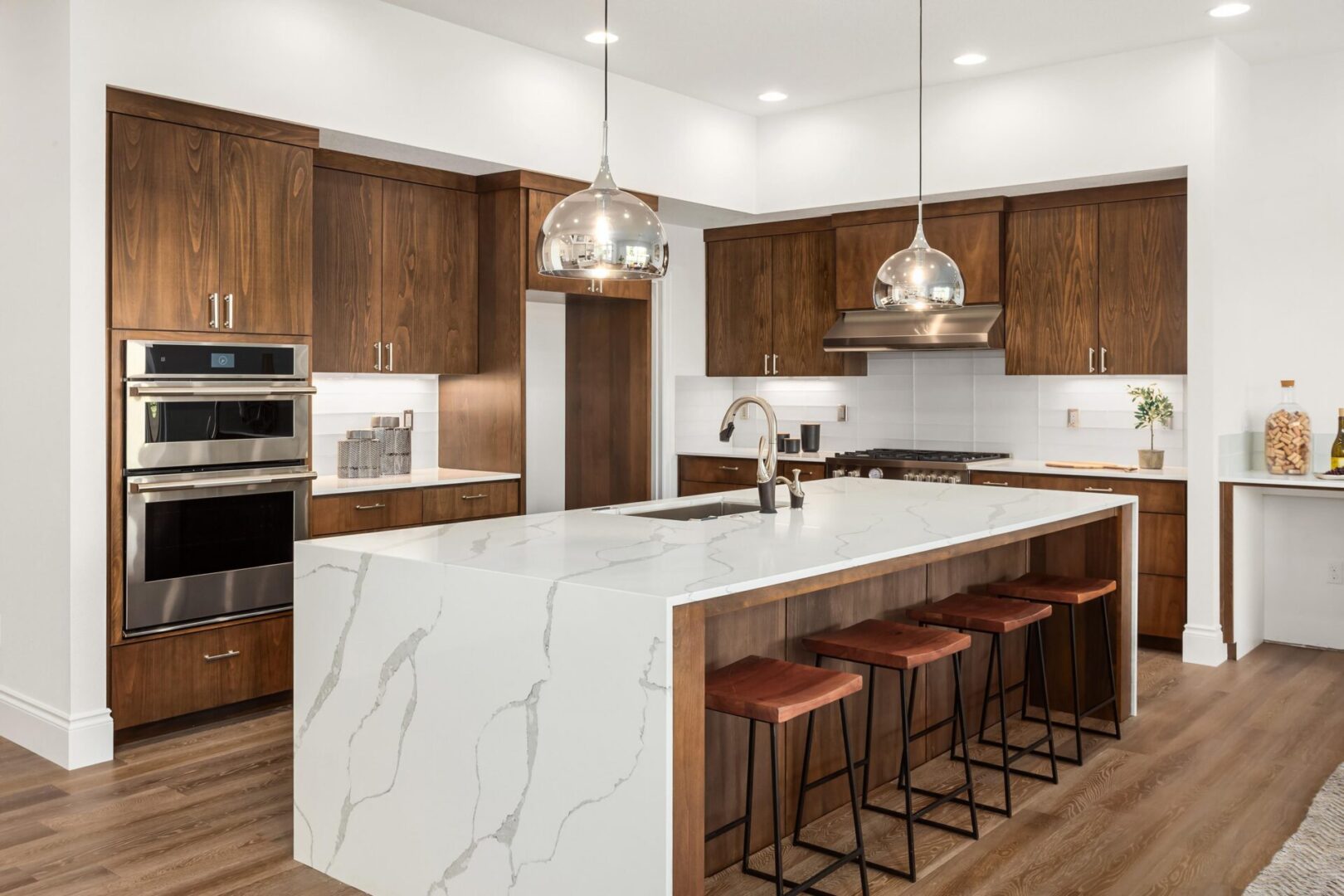 Modern kitchen with wooden cabinets and island.